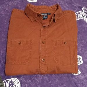 Rust cotton button up shirt.